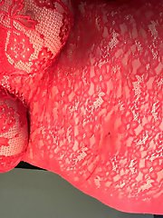 Seductive older woman showcases her intimate lips in a series of images