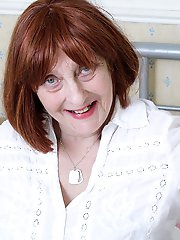 Naughty british mature lady getting wet on her bed