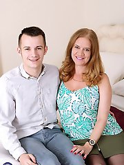 Big breasted British housewife having fun with her toy boy