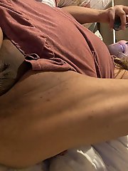 Aroused older woman with red hair on top of a younger man