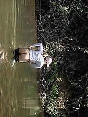 Young mature womans buttocks outdoors